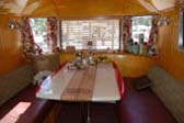 Slick and Stylish Dining Area in Classic 1948 Spartan Manor Trailer
